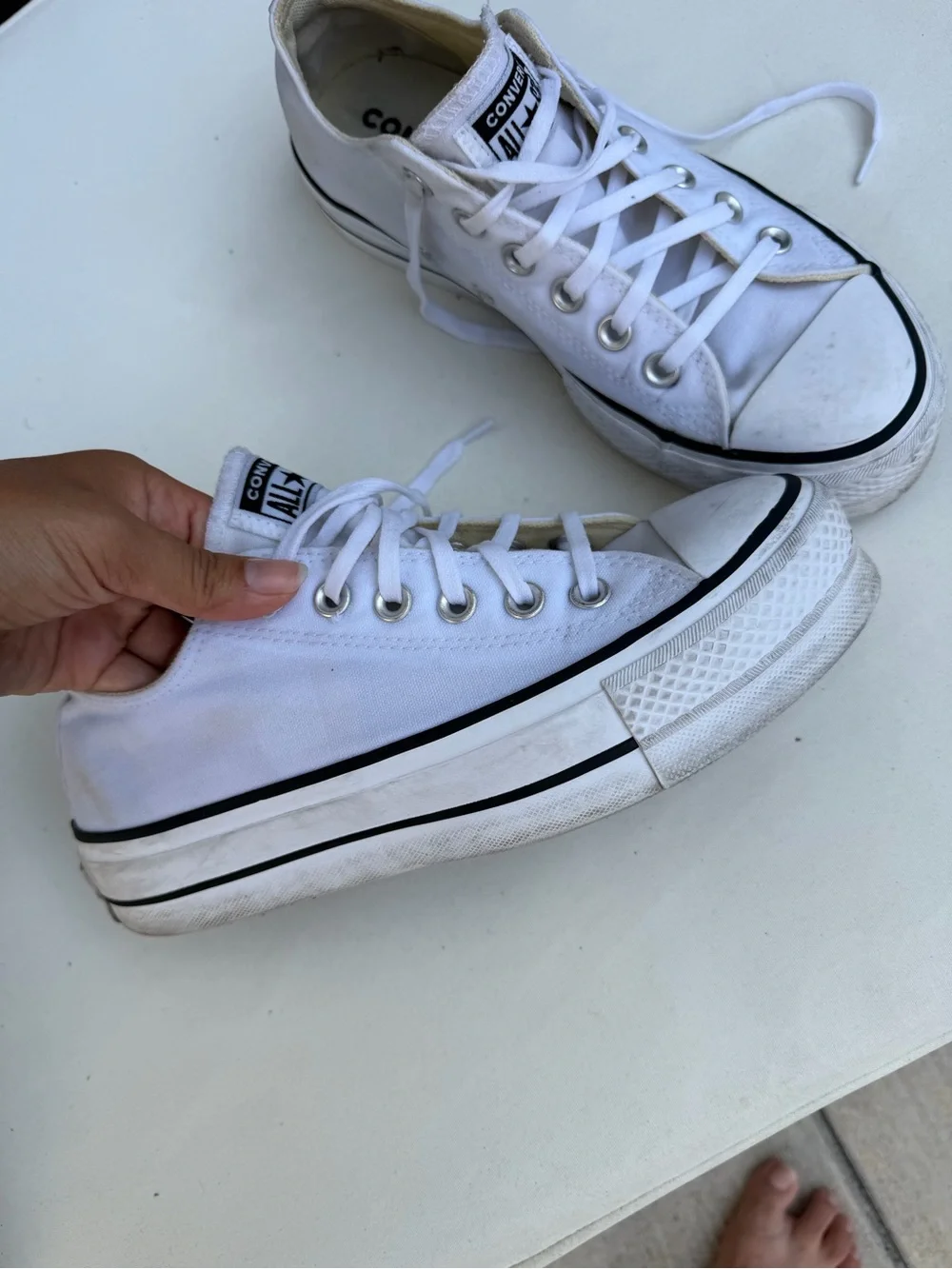 Converse women’s platform White Low Top Sneakers